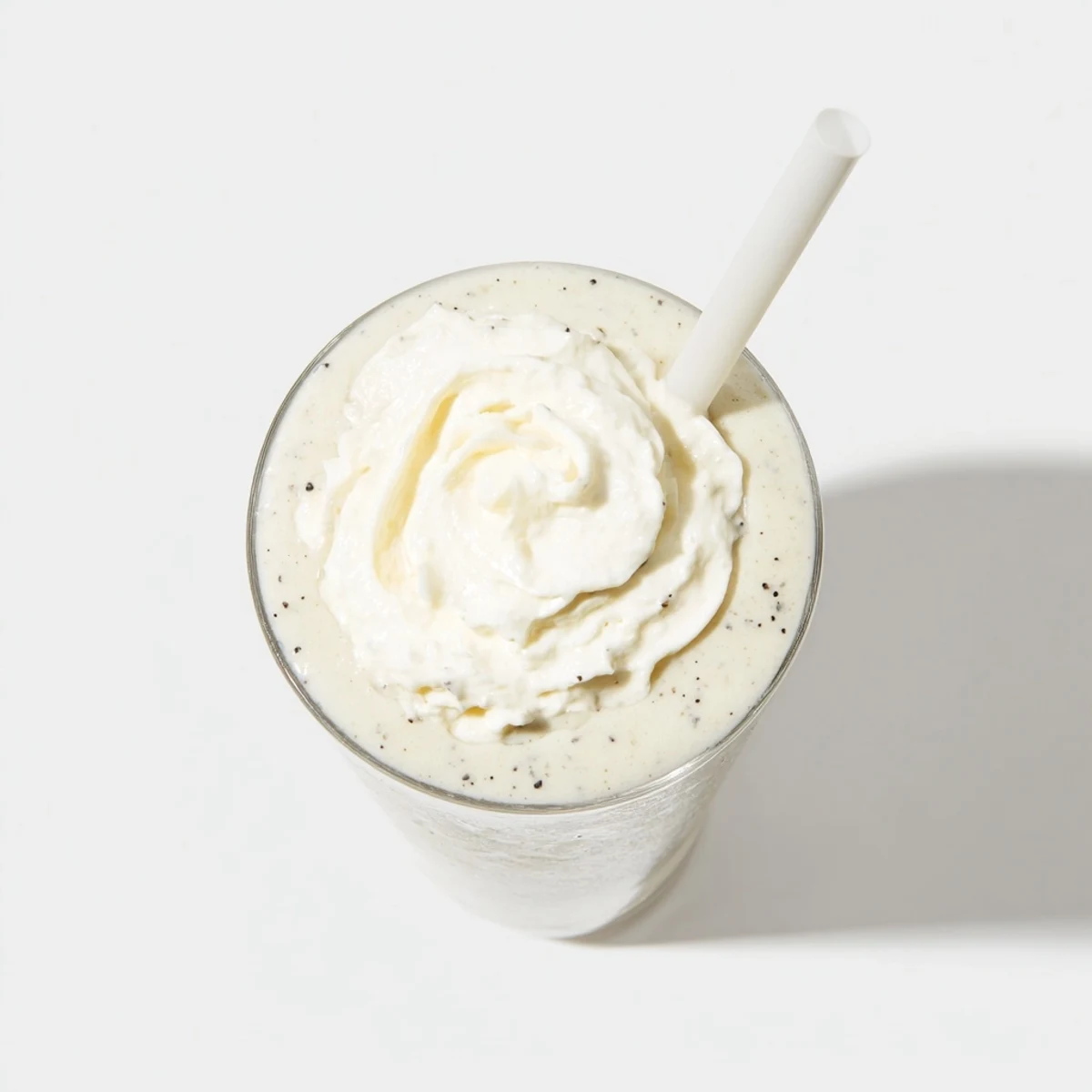 Vanilla Bean Frappuccino blended with ice and vanilla ice cream in a blender.