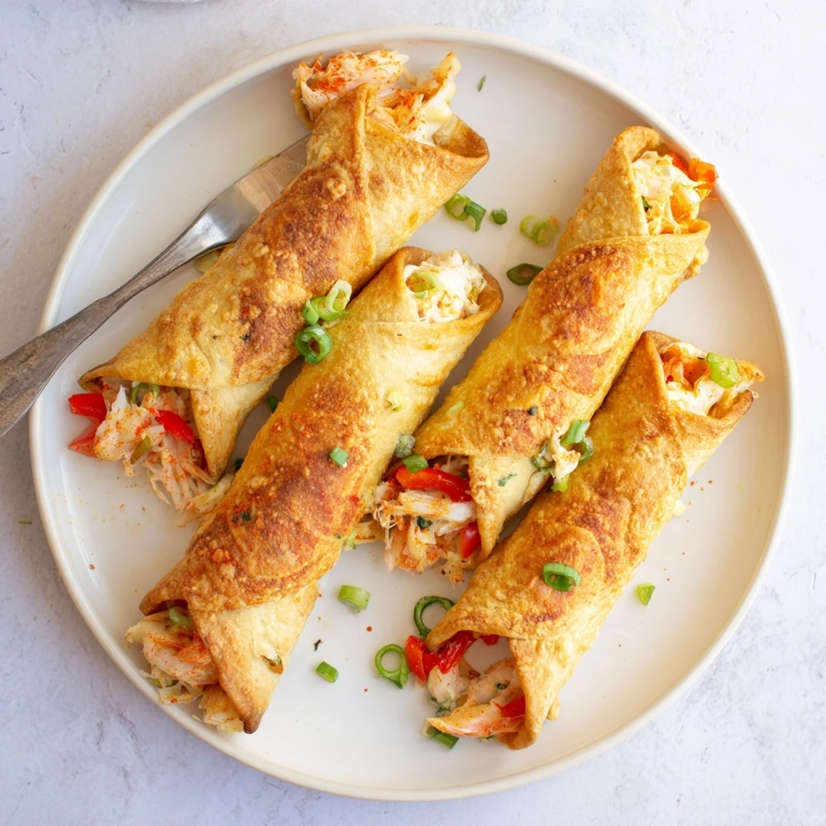 Fluffy tortilla-wrapped crab and shrimp bombs oozing with creamy Monterey Jack and red peppers