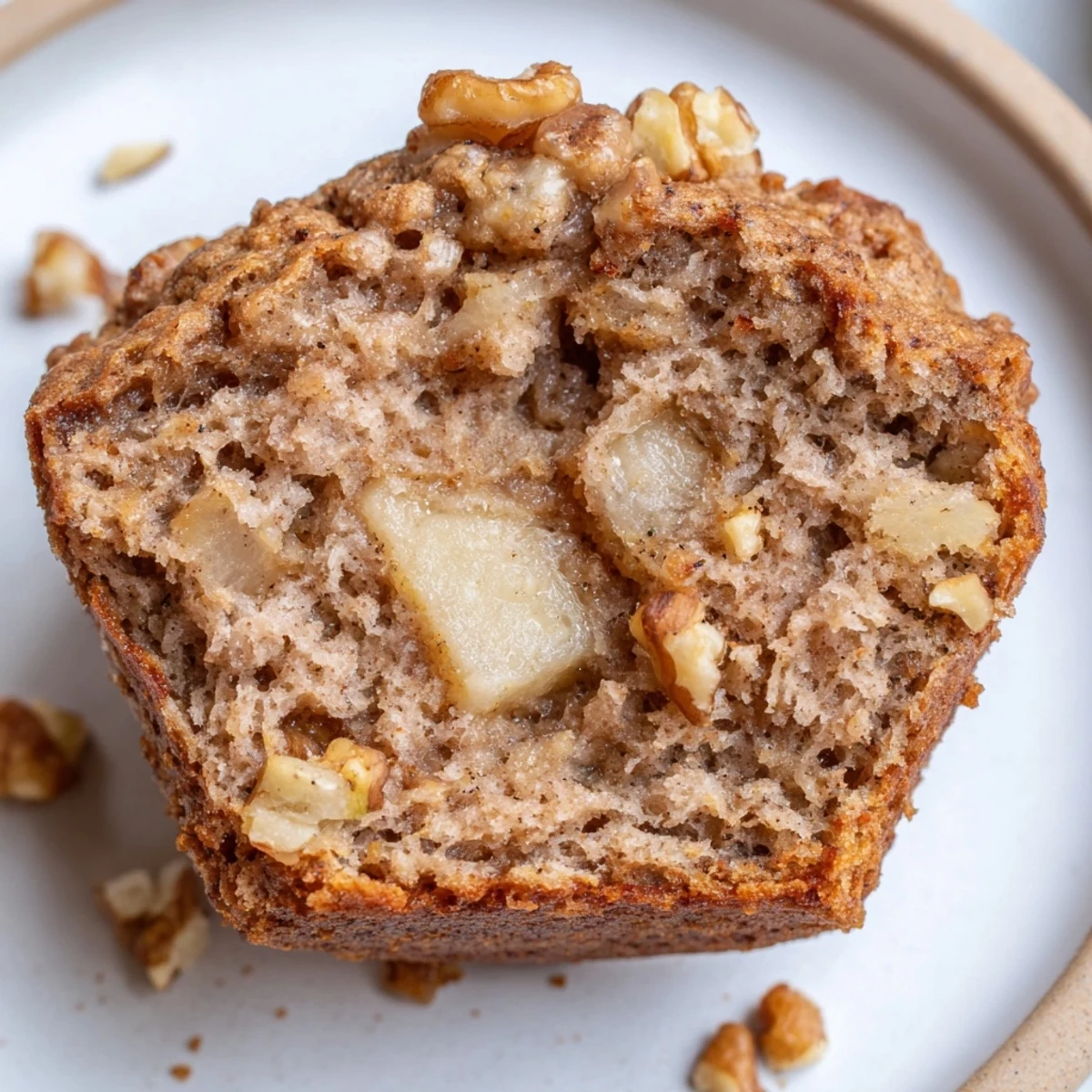 Healthy Apple Cinnamon Greek Yogurt Muffins steaming on wire rack, golden tops