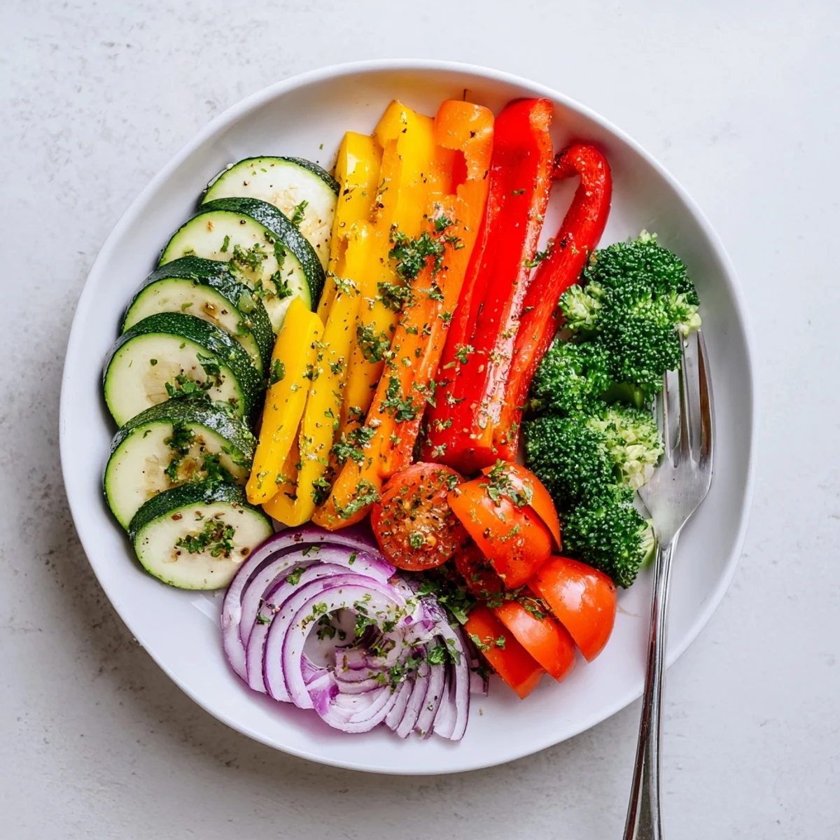 Garlic Infused Olive Oil Sauteed Veggies, vibrant peppers and zucchini steaming, garnished with parsley