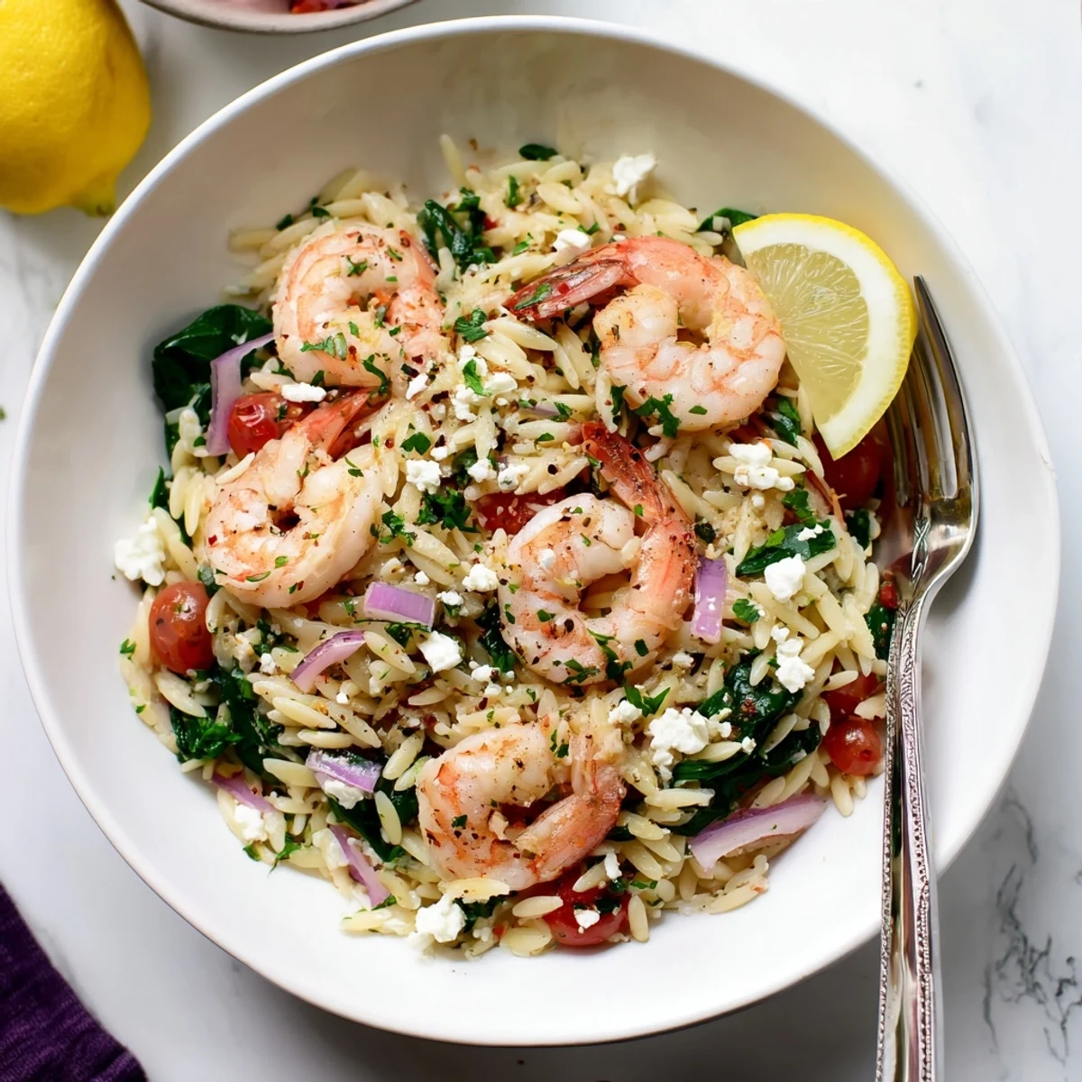 Weeknight Lemon Feta Orzo Shrimp Recipe served hot with parsley and lemon